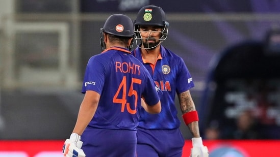 India's KL Rahul, right, celebrates with Rohit Sharma after hitting a boundary during the Cricket Twenty20 World Cup match between New Zealand and India in Dubai, UAE, Sunday.(AP)