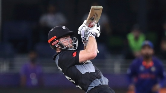 New Zealand's captain Kane Williamson hits a boundary during the Cricket Twenty20 World Cup match between New Zealand and India in Dubai, UAE, Sunday. (AP)