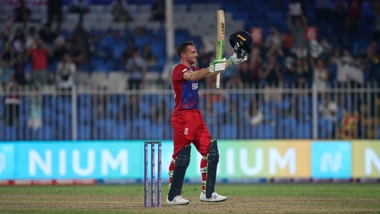 England's Jos Buttler celebrates after scoring a century during the Cricket Twenty20 World Cup match between England and Sri Lanka in Sharjah, UAE, Monday, Nov. 1, 2021.&nbsp;(AP)