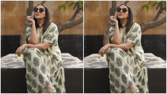 The off-white kaftan is intricately printed with motifs of green plants all over the body.(Instagram/@nehadhupia)