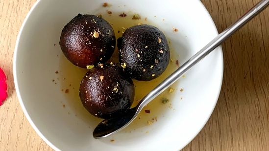 Gulab Jamun: It's hard to say no to warm gulab jamuns. This has to be one of the most loved sweets of all time. From Durga Puja to Diwali, no festival is complete without this soft and sweet dessert.(Pexels)