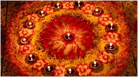 In case you want to ditch colours and opt for a complete flower rangoli, we suggest go for marigold. The shades of yellow and orange will deck up your doorstep like nothing else.(https://unsplash.com/)