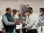 Abhay Chautala receiving winning certificate after winning Ellenabad by-poll in Sirsa district, Haryana. (Manoj Dhaka/Hindustan Times) Abhay Chautala receiving winning certificate after winning Ellenabad by-poll in Sirsa district, Haryana. (Manoj Dhaka/Hindustan Times)