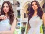 Mahira Khan often treats her fans and followers on Instagram with delightful pictures of herself wearing breathtaking ensembles. She may not have appeared on the Bollywood silver screen after Raees, but Mahira has left quite an impact on India's audience with her acting and fashion sense too. Her latest pictures in an embellished gown will also make you fall in love with her voguish style.