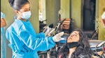A health worker collects swab sample of a resident for a Covid-19 test in Mumbai. Maharashtra recorded under 1,000 daily cases after a week as 809 infections were reported on Monday, the lowest single-day caseload since May 2, 2020. (PTI/File) A health worker collects swab sample of a resident for a Covid-19 test in Mumbai. Maharashtra recorded under 1,000 daily cases after a week as 809 infections were reported on Monday, the lowest single-day caseload since May 2, 2020. (PTI/File)