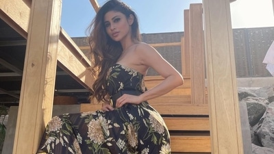 Mouni Roy's strapless sheer black maxi, ₹78k Gucci belt leaves us fawning (Instagram/imouniroy) Mouni Roy's strapless sheer black maxi, ₹78k Gucci belt leaves us fawning (Instagram/imouniroy)