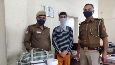 The suspect, Priyanshu Prakhar, with the police on Tuesday. (Sourced) The suspect, Priyanshu Prakhar, with the police on Tuesday. (Sourced)
