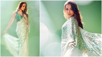 Add a little spark to your outfit by styling a sequins saree with a basic blouse and team it with heavy jewellery like Malaika Arora did with this Manish Malhotra saree. (Instagram/@malaikaaroraofficial) Add a little spark to your outfit by styling a sequins saree with a basic blouse and team it with heavy jewellery like Malaika Arora did with this Manish Malhotra saree. (Instagram/@malaikaaroraofficial)