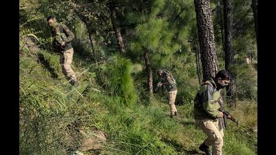 Security personnel take position during an encounter with militants at Nar Khas area of Mendhar in Poonch. (PTI File)