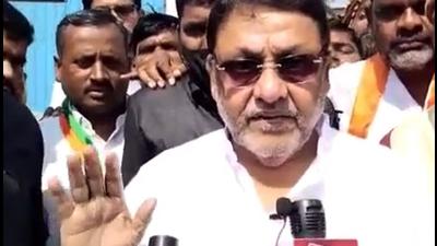 A file photo of Maharashtra minister Nawab Malik. He targeted Devendra Fadnavis again, linking him to ‘high-end’ parties when he was chief minister. (ANI/File) A file photo of Maharashtra minister Nawab Malik. He targeted Devendra Fadnavis again, linking him to ‘high-end’ parties when he was chief minister. (ANI/File)
