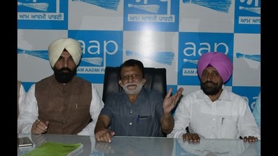 AAP leaders addressing a press conference at the party’s office in Ludhiana on Tuesday. (Harsimar Pal Singh/HT)