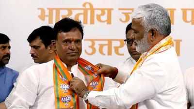 Samajwadi Party (SP) MLA from Saidpur, Subhash Pasi, joins the BJP in the presence of state president Swatantra Dev Singh in Lucknow on Tuesday. (ANI) Samajwadi Party (SP) MLA from Saidpur, Subhash Pasi, joins the BJP in the presence of state president Swatantra Dev Singh in Lucknow on Tuesday. (ANI)