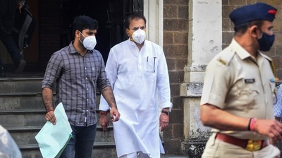 Former Maharashtra home minister Anil Deshmukh being taken to a hospital for his medical checkup, after his arrest in a money laundering case, in Mumbai on Tuesday. (PTI Photo) Former Maharashtra home minister Anil Deshmukh being taken to a hospital for his medical checkup, after his arrest in a money laundering case, in Mumbai on Tuesday. (PTI Photo)