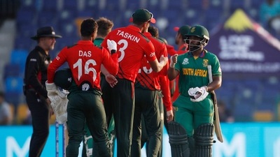 ICC Men's T20 World Cup - Super 12 - Group 1 - South Africa v Bangladesh - Sheikh Zayed Cricket Stadium, Abu Dhabi, United Arab Emirates - November 2, 2021 South Africa's Temba Bavuma bumps fists with Bangladesh's Taskin Ahmed at the end of play (REUTERS)