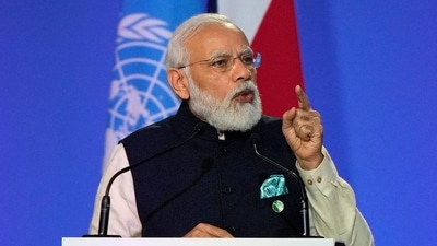 PM Modi addresses the COP26 UN climate change conference at Glasgow on Monday. (AFP Photo) PM Modi addresses the COP26 UN climate change conference at Glasgow on Monday. (AFP Photo)