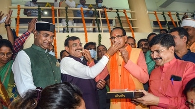 Madhya Pradesh CM Shivraj Singh Chouhan along with BJP state president VD Sharma celebrate (PTI Photo) Madhya Pradesh CM Shivraj Singh Chouhan along with BJP state president VD Sharma celebrate (PTI Photo)