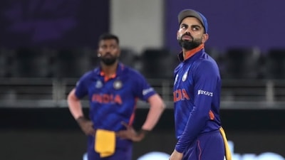 India's captain Virat Kohli reacts to a boundary hit by New Zealand's Daryl Mitchell during the Cricket Twenty20 World Cup match between New Zealand and India in Dubai, UAE, (AP) India's captain Virat Kohli reacts to a boundary hit by New Zealand's Daryl Mitchell during the Cricket Twenty20 World Cup match between New Zealand and India in Dubai, UAE, (AP)