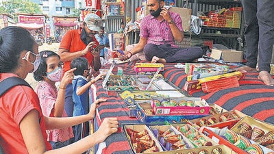 Children line up to purchase firecrackers on Tuesday, at a stall behind Bharati Vidyapeeth ahead of Diwali. As Diwali is here, the air quality index (AQI) is likely to deteriorate to poor on November 4 and very poor on November 5, according to officials from the System of Air Quality and Weather Forecasting and Research (Safar). (RAVINDRA JOSHI/HT) Children line up to purchase firecrackers on Tuesday, at a stall behind Bharati Vidyapeeth ahead of Diwali. As Diwali is here, the air quality index (AQI) is likely to deteriorate to poor on November 4 and very poor on November 5, according to officials from the System of Air Quality and Weather Forecasting and Research (Safar). (RAVINDRA JOSHI/HT)