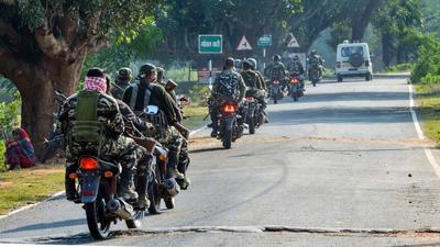 Security personnel patrol a Maoist-affected area ahead of the by-elections in Tarapur on October 28, 2021. (PTI/File) Security personnel patrol a Maoist-affected area ahead of the by-elections in Tarapur on October 28, 2021. (PTI/File)