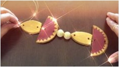 Wall hangings make your walls look much prettier. For this Diwali, you can opt for clay wall hanging made in the shape of diyas. Surround it with fairy lights and watch your wall become the photo zone of the party. (https://in.pinterest.com/) Wall hangings make your walls look much prettier. For this Diwali, you can opt for clay wall hanging made in the shape of diyas. Surround it with fairy lights and watch your wall become the photo zone of the party. (https://in.pinterest.com/)
