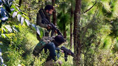 Security personnel near the site of an encounter with militants at Nar Khas area of Mendhar, in Poonch. (PTI File) Security personnel near the site of an encounter with militants at Nar Khas area of Mendhar, in Poonch. (PTI File)