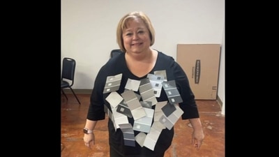 This mom won the Halloween costume contest as 'Fifty Shades of Grey".&nbsp; (twitter/@coreytimes)