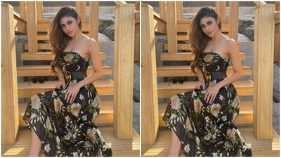 Mouni posed in an outdoor setup, on a wooden structure, as she looked at the camera. (Instagram/@imouniroy) Mouni posed in an outdoor setup, on a wooden structure, as she looked at the camera. (Instagram/@imouniroy)