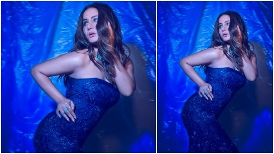 Hina Khan accessorised her look with a heavy diamond choker. For makeup, Hina Khan opted for blue metallic eyes and nude lips.(Instagram/@realhinakhan)