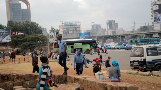 Police officers walk amongst civilians at the Meskel Square in Addis Ababa, Ethiopia.(REUTERS file)