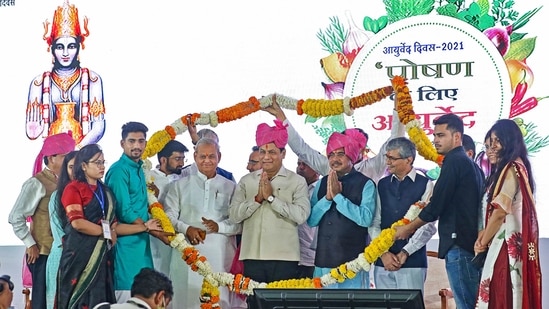 Union minister Sarbananda Sonowal with minister of state for Ayush Munjpara Mahendrabhai Kalubhai being welcomed during the 6th Ayurveda Day celebration function at National Institue of Ayurveda in Jaipur on Tuesday. (PTI) Union minister Sarbananda Sonowal with minister of state for Ayush Munjpara Mahendrabhai Kalubhai being welcomed during the 6th Ayurveda Day celebration function at National Institue of Ayurveda in Jaipur on Tuesday. (PTI)