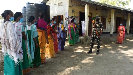 Voters stand in a queue to cast their votes during the bypolls at a polling booth, in Assam's Baksa on Saturday. Voters stand in a queue to cast their votes during the bypolls at a polling booth, in Assam's Baksa on Saturday.