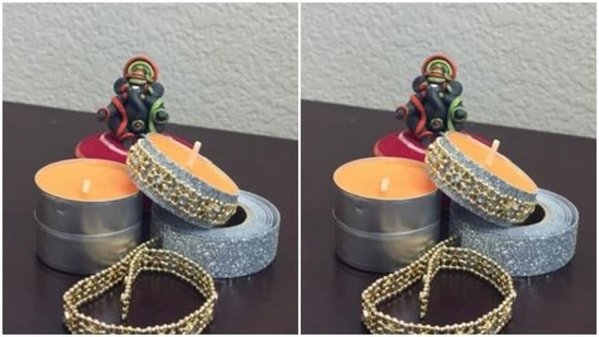 Candles and diyas lit up the homes during Diwali. Why not decorate them to look brighter? This year, surround the candles in silver or golden zari and other decorative items and watch them change the tone of your living room.(https://in.pinterest.com/)