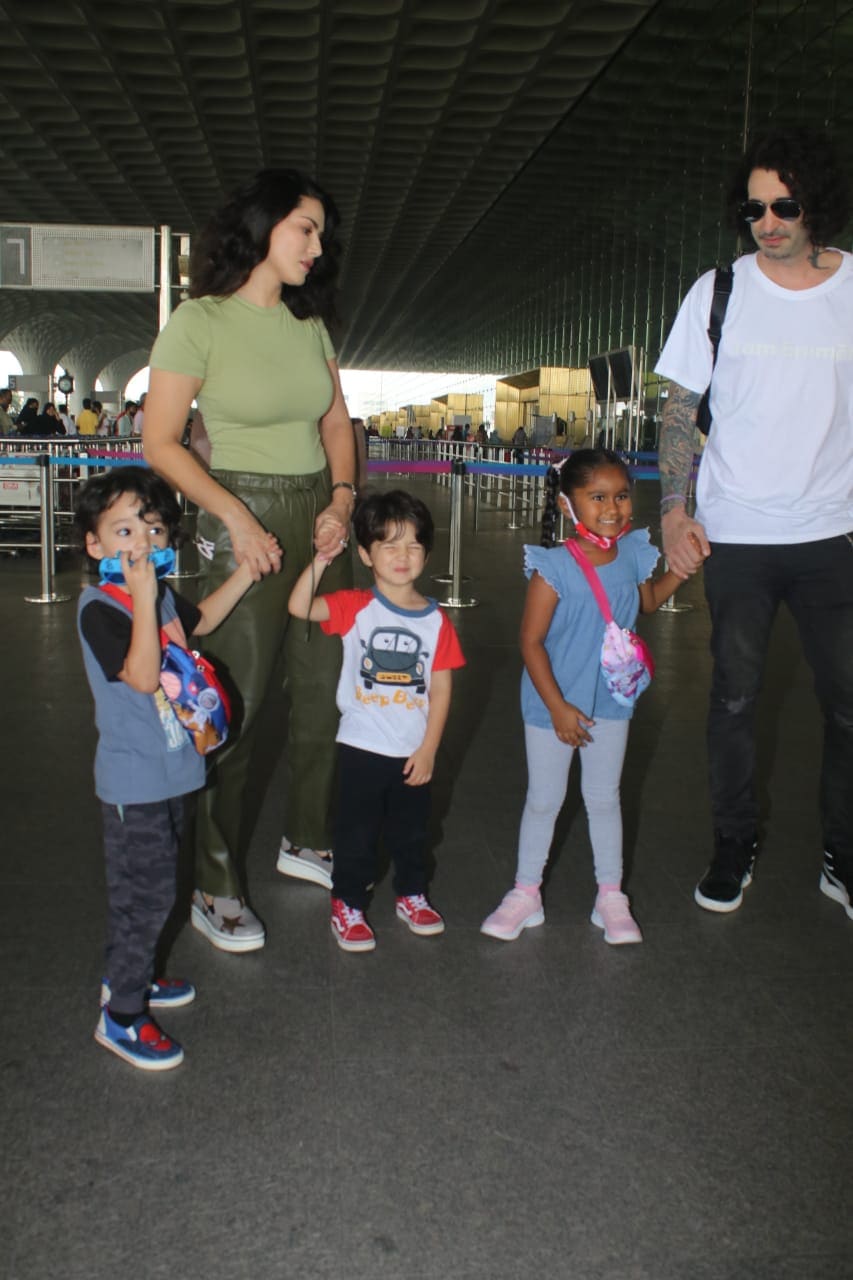 Sunny Leone, her husband Daniel Weber and their children Nisha Kaur Weber. Noah Singh Weber and Asher Singh Weber at Mumbai airport.(Varinder Chawla)