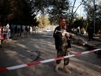 A Taliban fighter stands guard at the cordoned off area after yesterday's blasts and gunfire, beside the military hospital in Kabul, Afghanistan November 3, 2021.&nbsp;