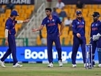 India's Ravichandran Ashwin, without cap, celebrates with teammates after dismissing Afghanistan's Gulbadin Naib during the Cricket Twenty20 World Cup match between India and Afghanistan in Abu Dhabi, UAE, Wednesday, Nov. 3, 2021. (AP Photo/Aijaz Rahi)(AP)