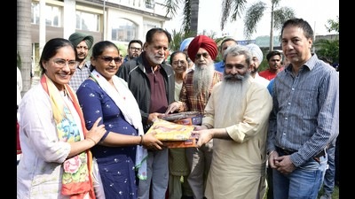 Cabinet minister Bharat Bhushan Ashu and mayor Balkar Sandhu celebrating Diwali with sanitation workers of the Ludhiana MC on Wednesday. (Harsimar Pal Singh/HT) Cabinet minister Bharat Bhushan Ashu and mayor Balkar Sandhu celebrating Diwali with sanitation workers of the Ludhiana MC on Wednesday. (Harsimar Pal Singh/HT)