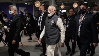 Indian Prime Minister Narendra Modi at the venue of the COP26 UN-led summit on climate change, in Glasgow, Scotland on Tuesday. (AP) Indian Prime Minister Narendra Modi at the venue of the COP26 UN-led summit on climate change, in Glasgow, Scotland on Tuesday. (AP)
