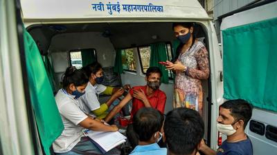Traders and transporters during a special vaccination drive against Covid-19 by Navi Mumbai Municipal Corporation, in Navi Mumbai, on Tuesday. (PTI)