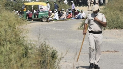 A policeman stands guard at a designated namaz site in Sector 47 in October, following protests and threats by right-wing Hindu groups. (Vipin Kumar/HT PHOTO) A policeman stands guard at a designated namaz site in Sector 47 in October, following protests and threats by right-wing Hindu groups. (Vipin Kumar/HT PHOTO)