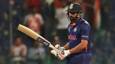 India's Rohit Sharma reacts after scoring 50 runs during the Cricket Twenty20 World Cup match between India and Afghanistan in Abu Dhabi, UAE, Wednesday, Nov. 3, 2021. (AP)
