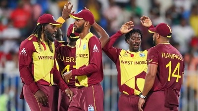 West Indies players celebrate after defeating Bangladesh by three runs in their Cricket Twenty20 World Cup match in Sharjah, UAE. (AP) West Indies players celebrate after defeating Bangladesh by three runs in their Cricket Twenty20 World Cup match in Sharjah, UAE. (AP)