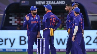 India's Rohit Sharma talks to captain Virat Kohli after the fall of Zealand's Martin Guptill wicket during the Cricket Twenty20 World Cup match between New Zealand and India in Dubai, UAE. (AP) India's Rohit Sharma talks to captain Virat Kohli after the fall of Zealand's Martin Guptill wicket during the Cricket Twenty20 World Cup match between New Zealand and India in Dubai, UAE. (AP)