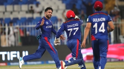 Afghanistan's Rashid Khan celebrates the wicket of Scotland's Brad Wheal during the Cricket Twenty20 World Cup match between Afghanistan and Scotland in Sharjah, UAE, Monday, Oct. 25, 2021. (AP) Afghanistan's Rashid Khan celebrates the wicket of Scotland's Brad Wheal during the Cricket Twenty20 World Cup match between Afghanistan and Scotland in Sharjah, UAE, Monday, Oct. 25, 2021. (AP)