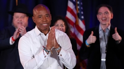 Democratic candidate for New York City Mayor Eric Adams gestures to attendees after being declared victor at his election night party in Brooklyn, New York. (REUTERS)