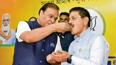 Assam Chief Minister Dr. Himanta Biswa Sarma offers sweets to Assam BJP General secretary Phanindra Nath after the party wins the state by-polls, at Hengrabari, in Guwahati on Tuesday. (ANI) Assam Chief Minister Dr. Himanta Biswa Sarma offers sweets to Assam BJP General secretary Phanindra Nath after the party wins the state by-polls, at Hengrabari, in Guwahati on Tuesday. (ANI)