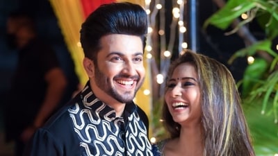 Dheeraj Dhoopar and his wife Vinny smile as they get snapped at the party. Dheeraj Dhoopar and his wife Vinny smile as they get snapped at the party.