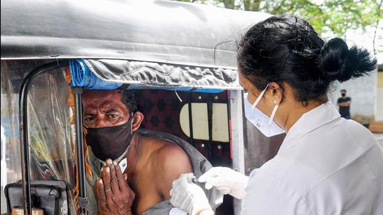 The Kerala chief minister Pinarayi Vijayan directed the health department to issue guidelines on the matter including keeping physical distancing in theatres and wearing masks. (PTI)