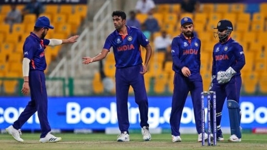 India's Ravichandran Ashwin, without cap, celebrates with teammates after dismissing Afghanistan's Gulbadin Naib during the Cricket Twenty20 World Cup match between India and Afghanistan in Abu Dhabi, UAE, Wednesday, Nov. 3, 2021. (AP Photo/Aijaz Rahi)(AP)