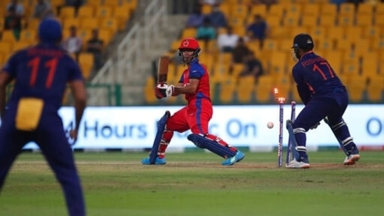 Afghanistan's Najibullah Zadran is bowled out by India's Ravichandran Ashwin during the Cricket Twenty20 World Cup match between India and Afghanistan in Abu Dhabi, UAE, Wednesday, Nov. 3, 2021. (AP Photo/Aijaz Rahi)(AP)