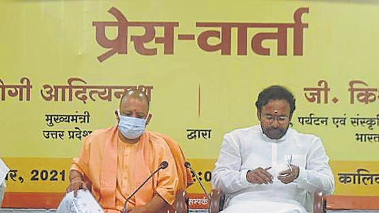Uttar Pradesh chief minister Yogi Adityanath and Union minister G Kishan Reddy at a press briefing about the Annapurna idol, in Lucknow on Wednesday. (Deepak Gupta/HT Photo)
